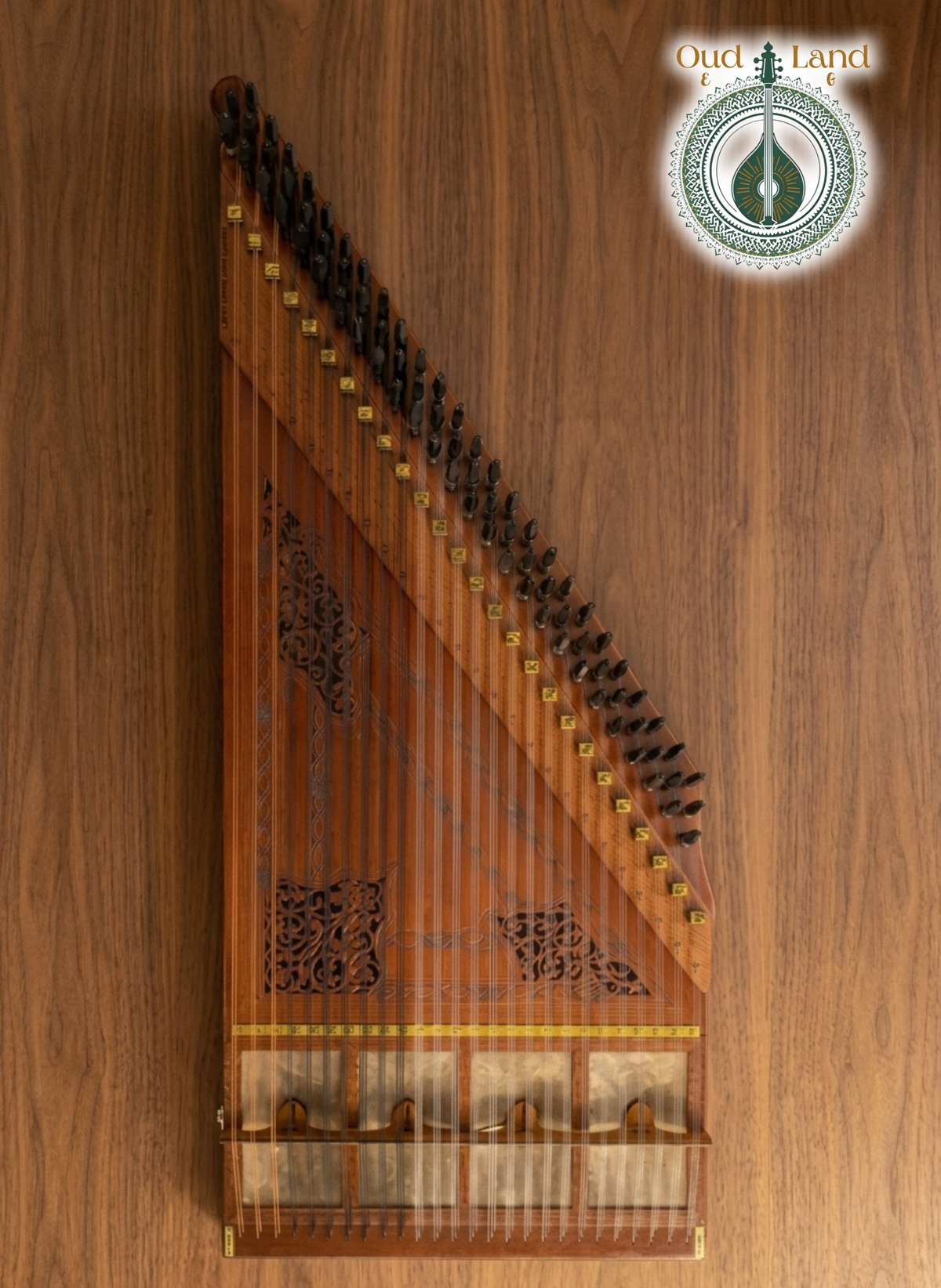 Traditional Arabic Qanun musical instrument in natural amber wood finish with custom laser carving by Oud Land