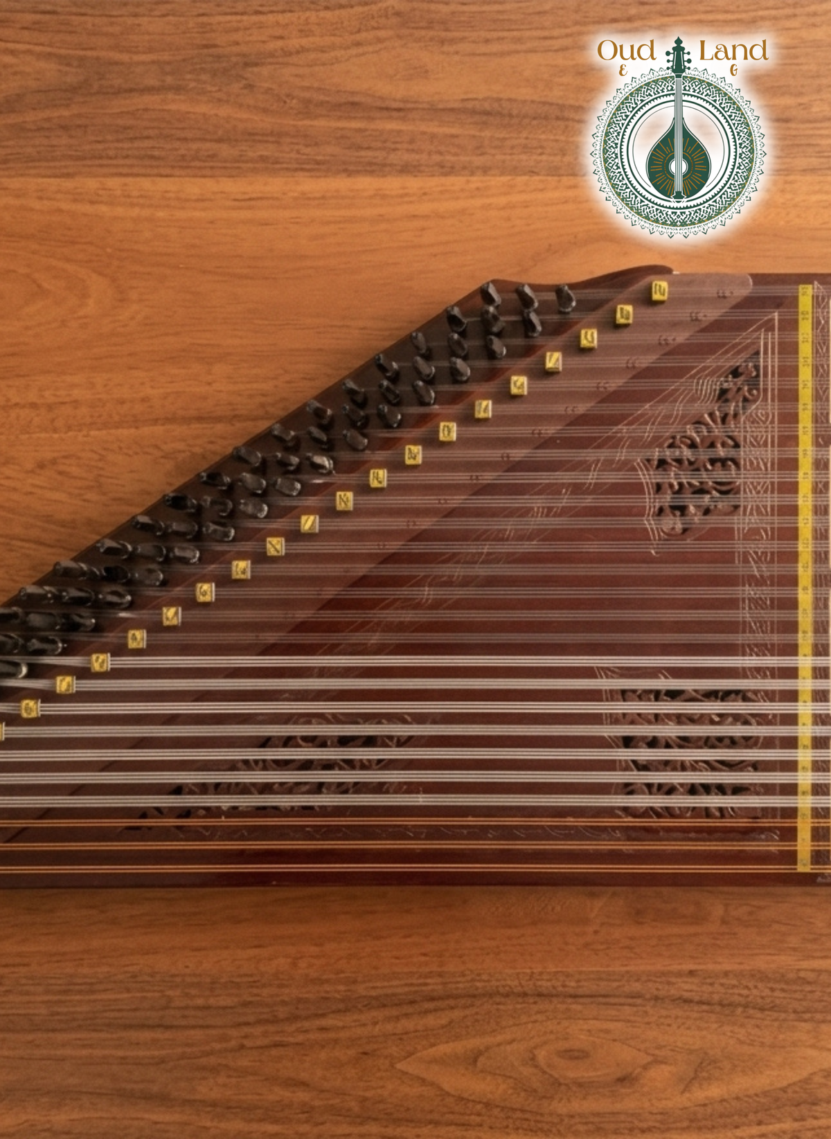 Intricate hand-carved wooden rosette ornamentations on the face of a professional Qanun.